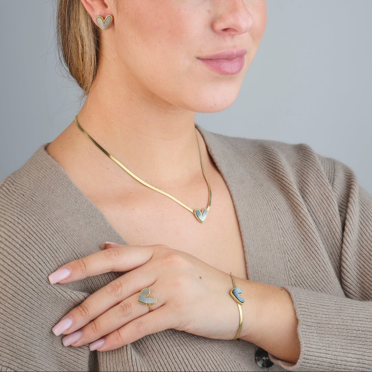 Armband parelmoer hart goud - Desieradenconcurrent.nl