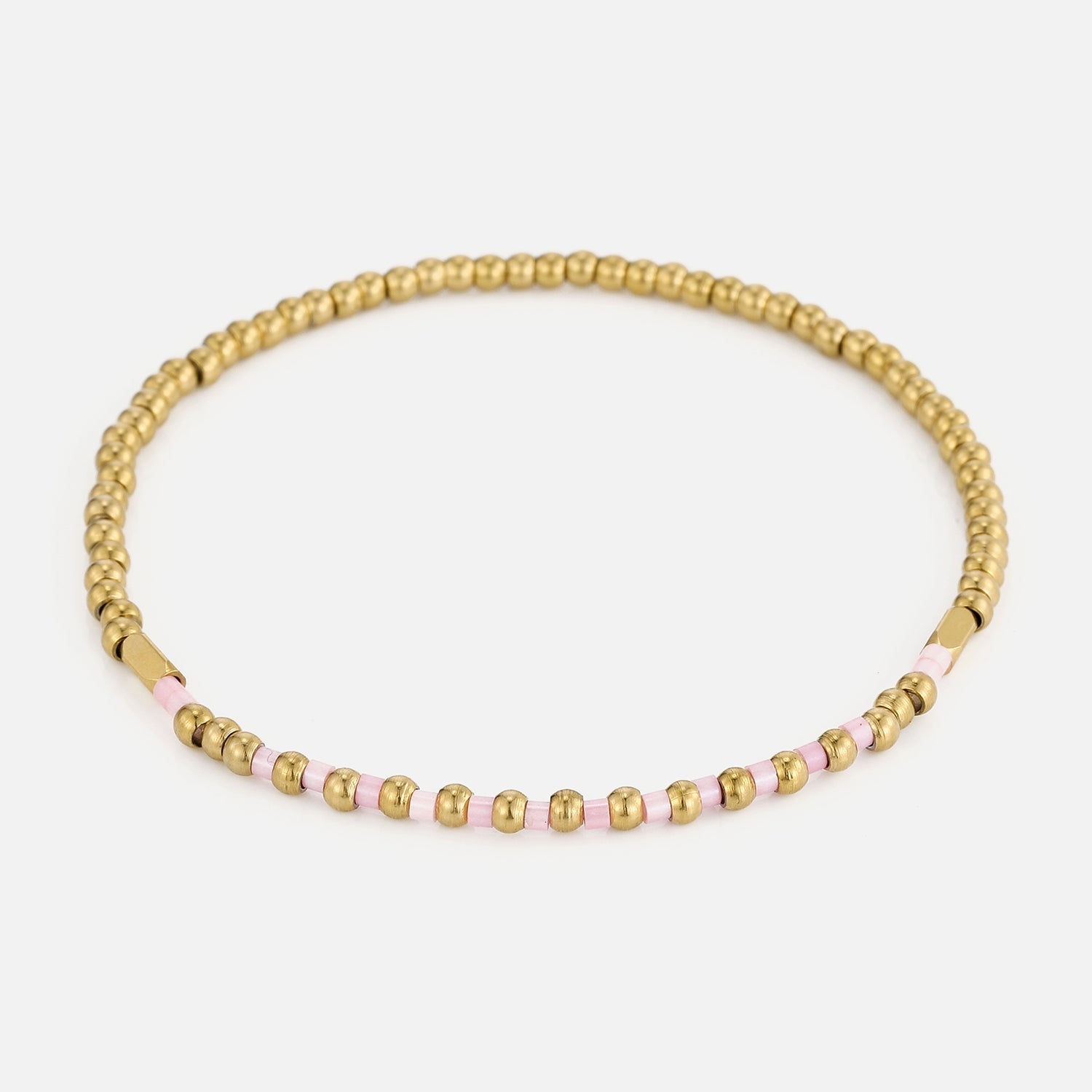Armband roze kralen stretch goud - Desieradenconcurrent.nl