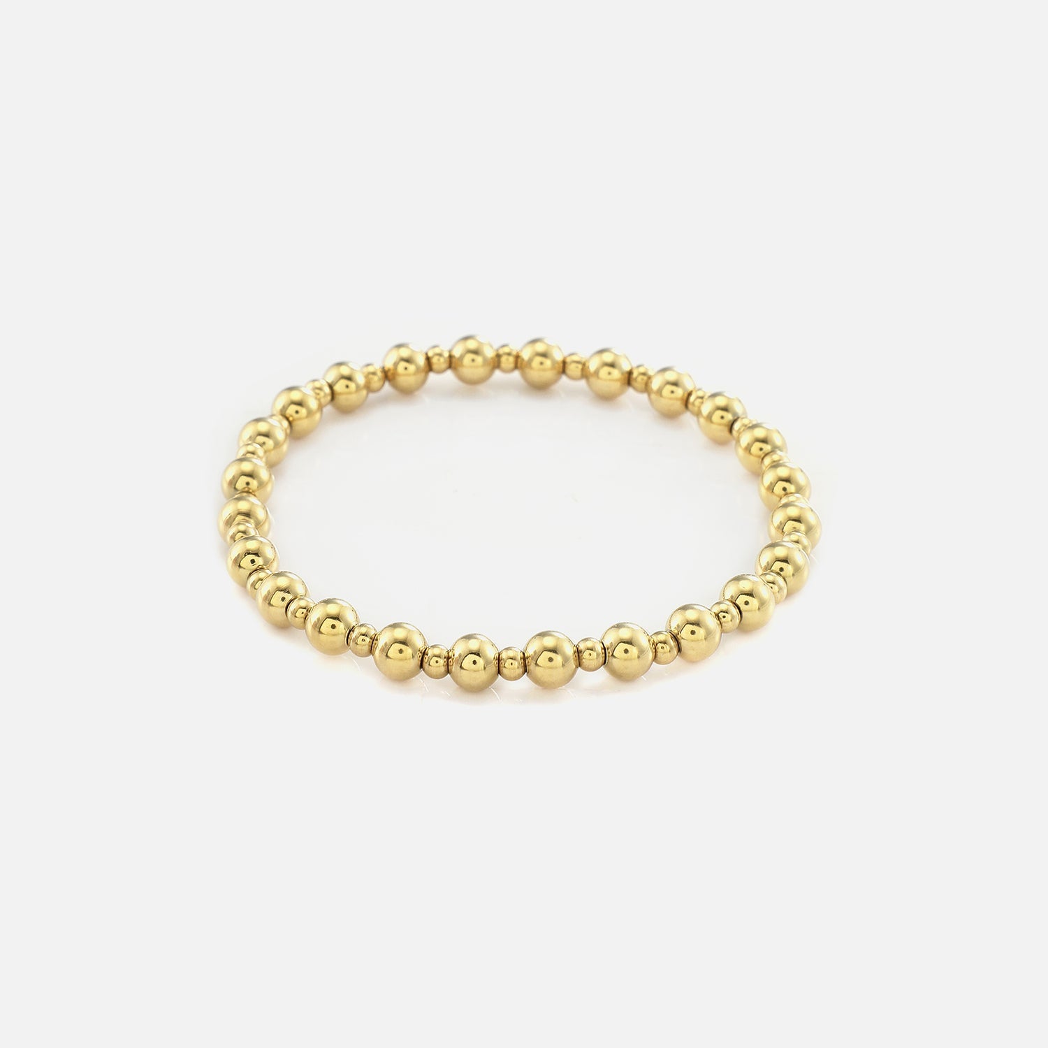 Armband stretch bolletjes goud - Desieradenconcurrent.nl