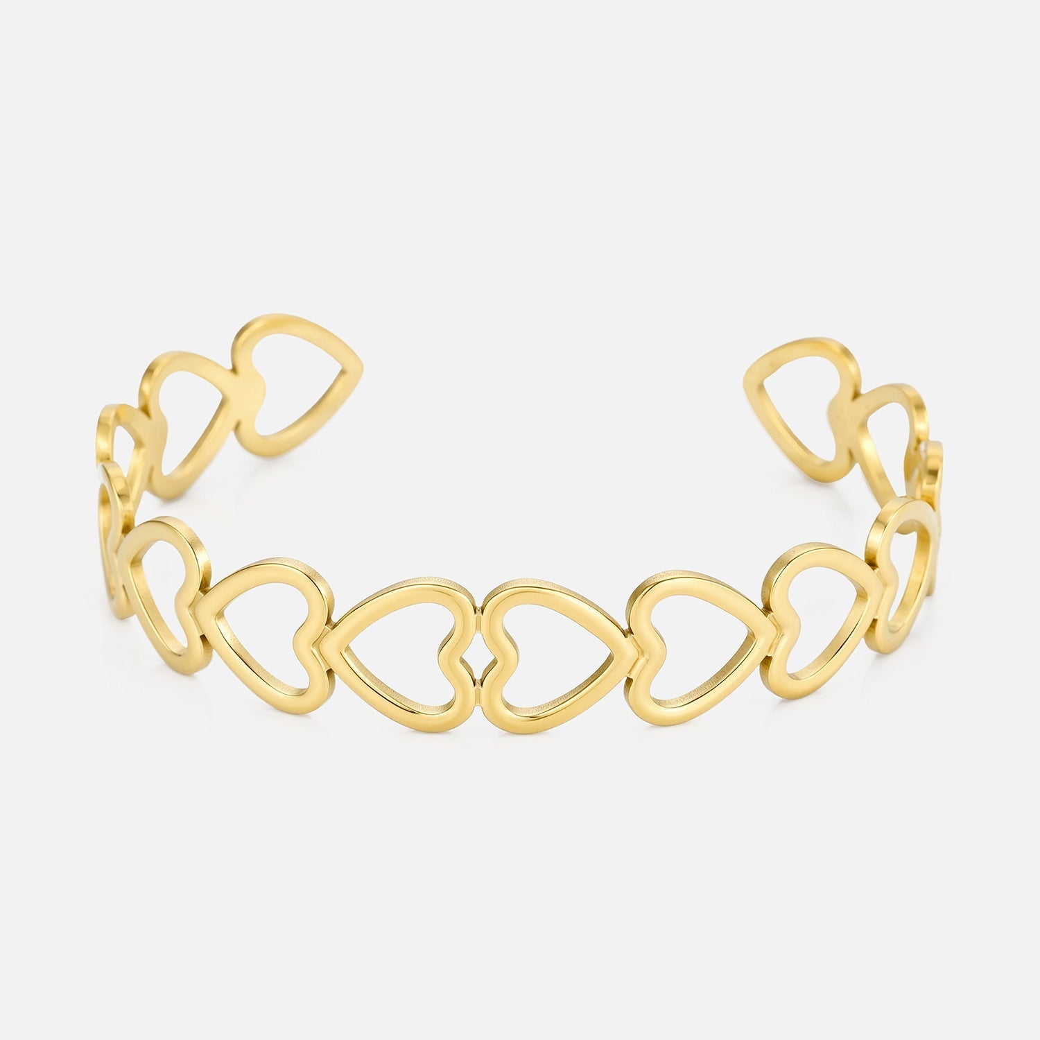 Bangle verbonden hartjes goud - Desieradenconcurrent.nl