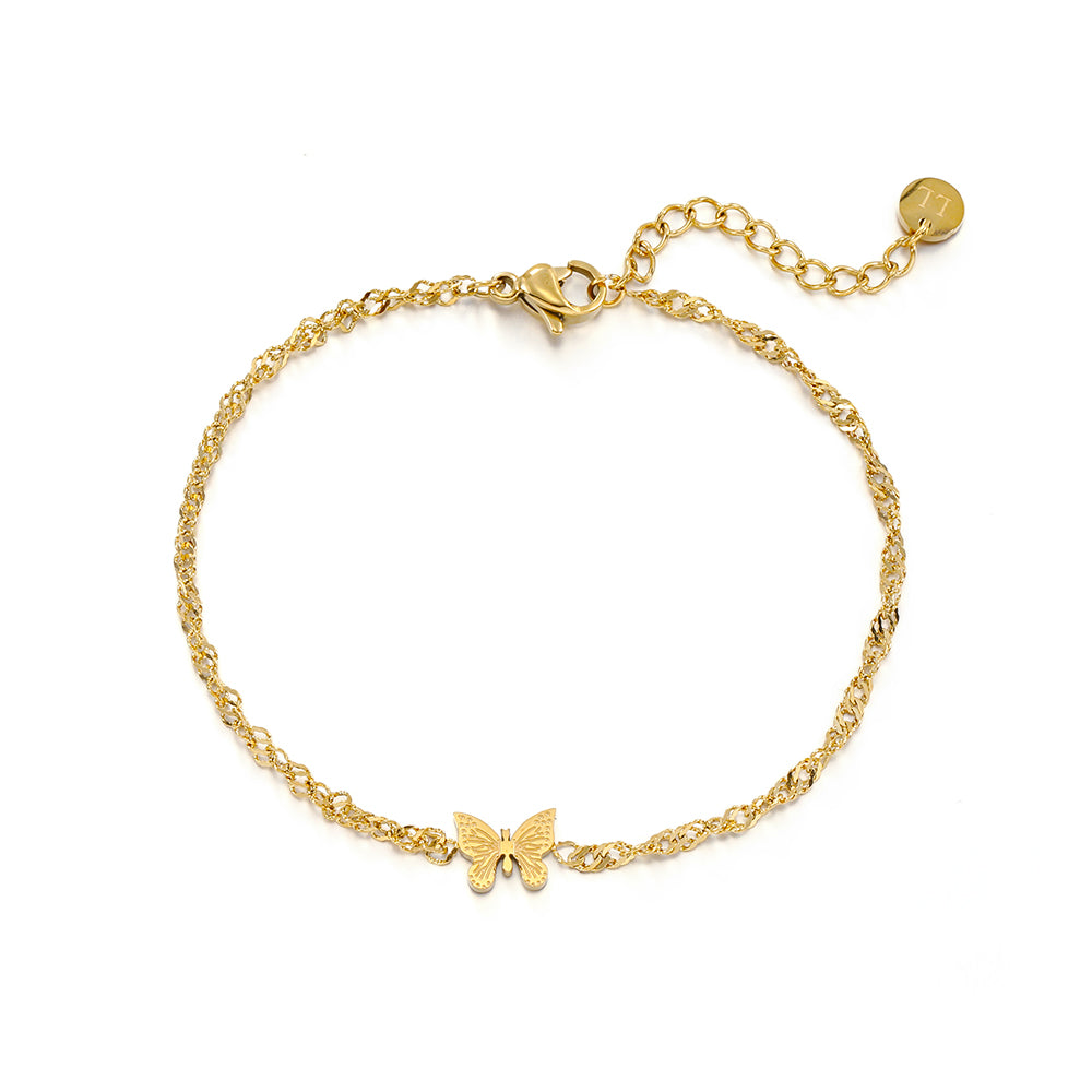 Gouden dames armband met vlinder bedeltje. Teken van vrijheid.