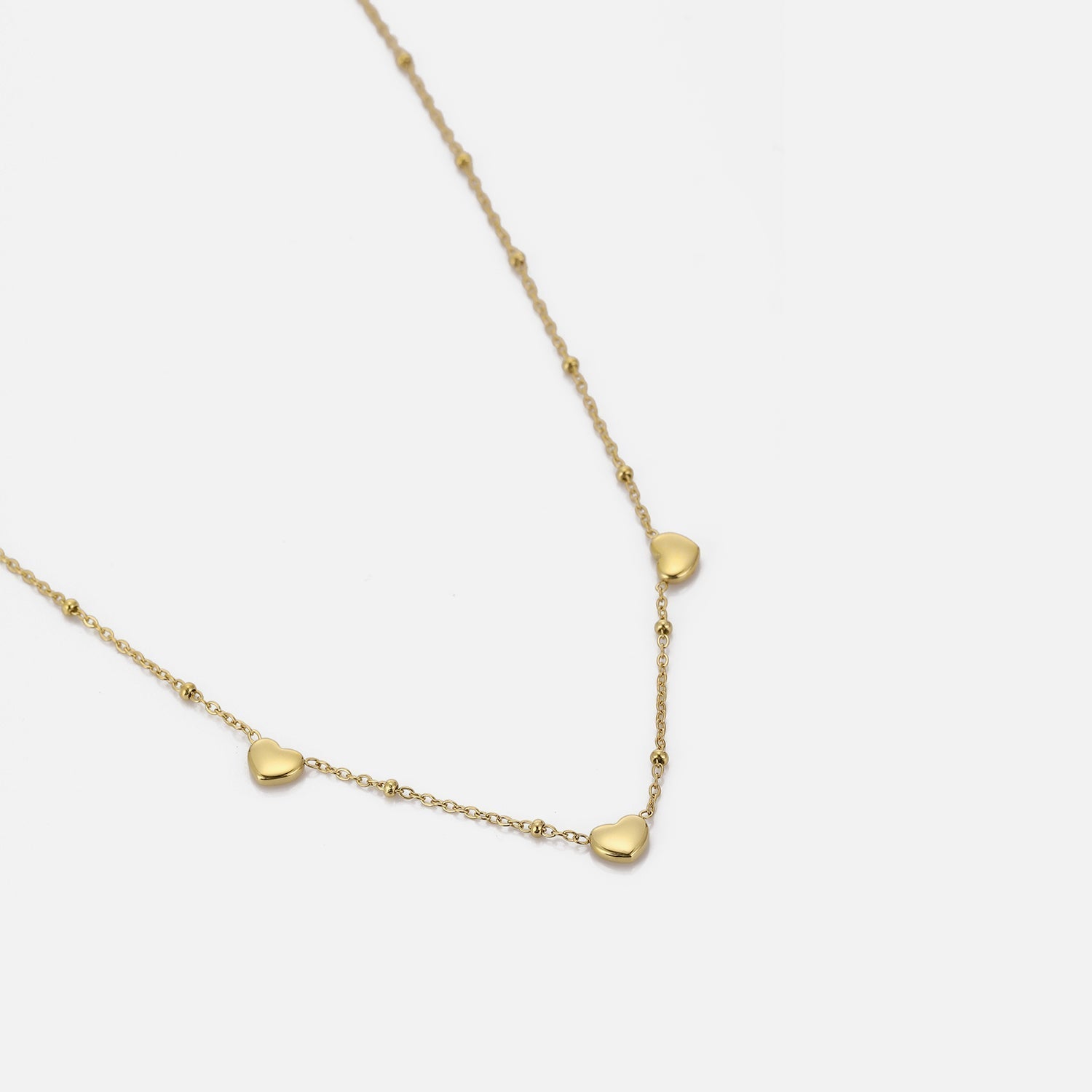 Ketting drie hartjes goud - Desieradenconcurrent.nl