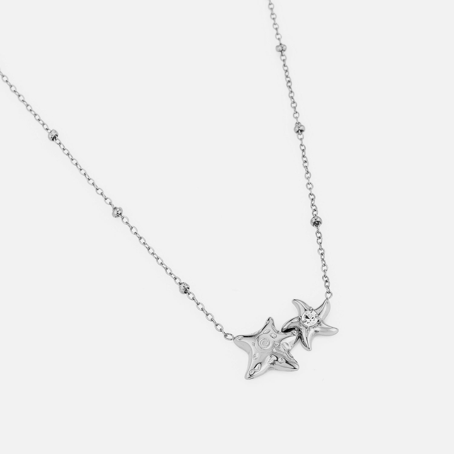 Ketting verbonden sterren zilver - Desieradenconcurrent.nl
