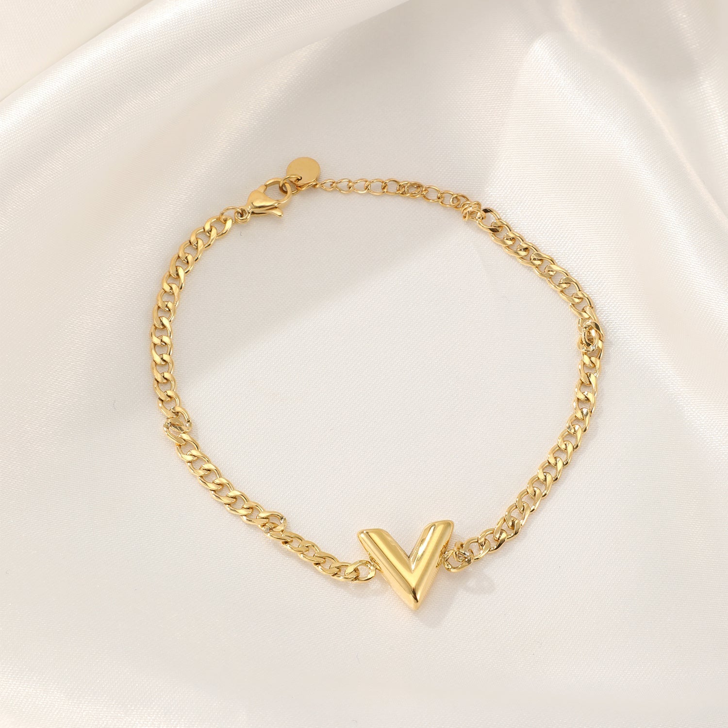 Schakelarmband V goud - Desieradenconcurrent.nl