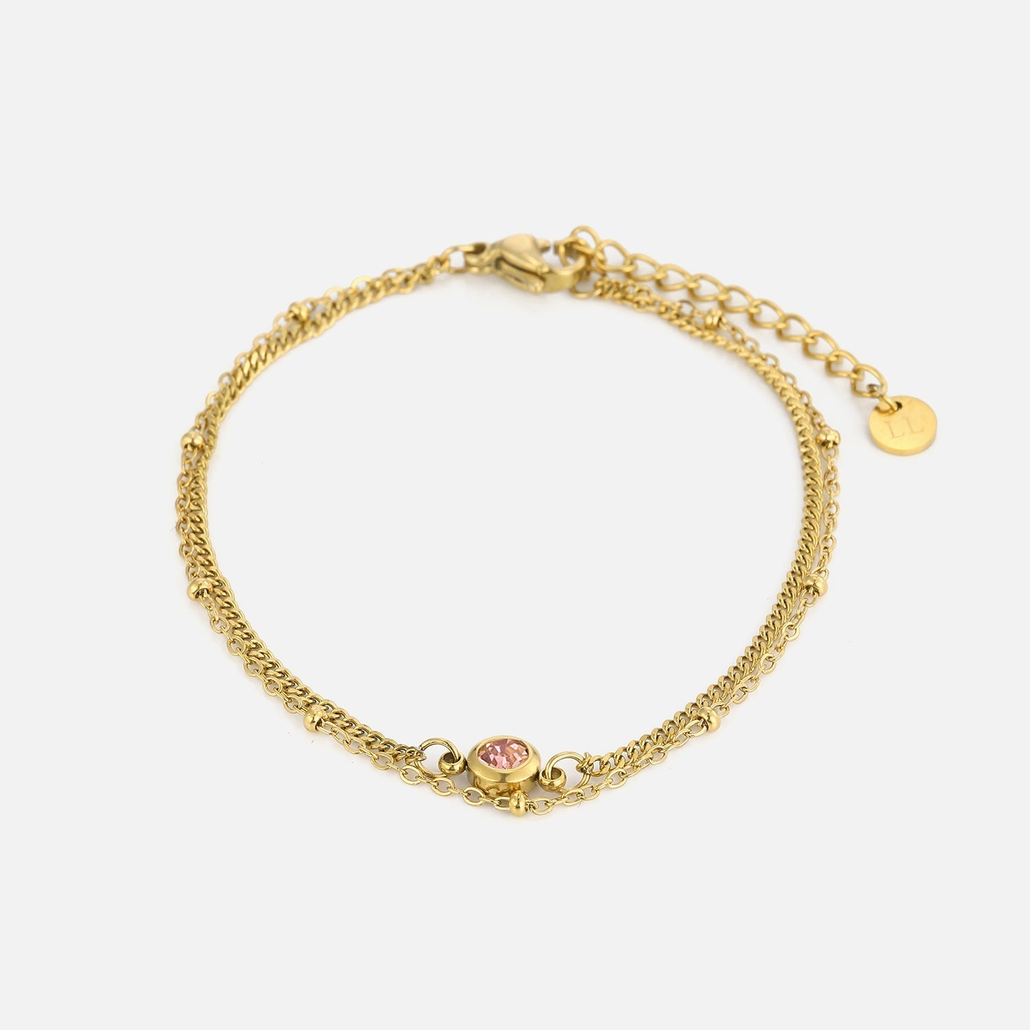 Tweelaags armband met roze steentje goud - Desieradenconcurrent.nl