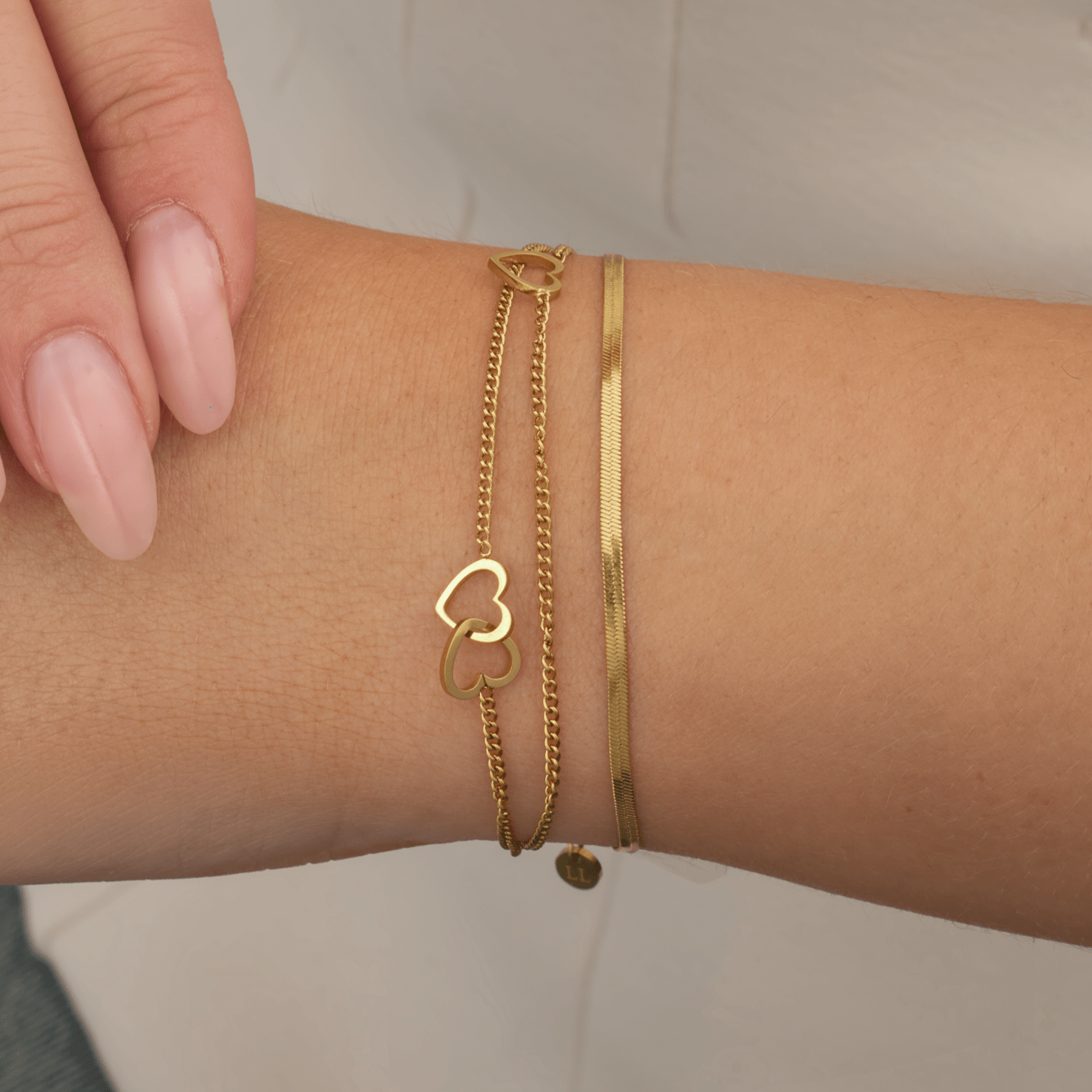 Armband drielaags hart goud - Desieradenconcurrent.nl