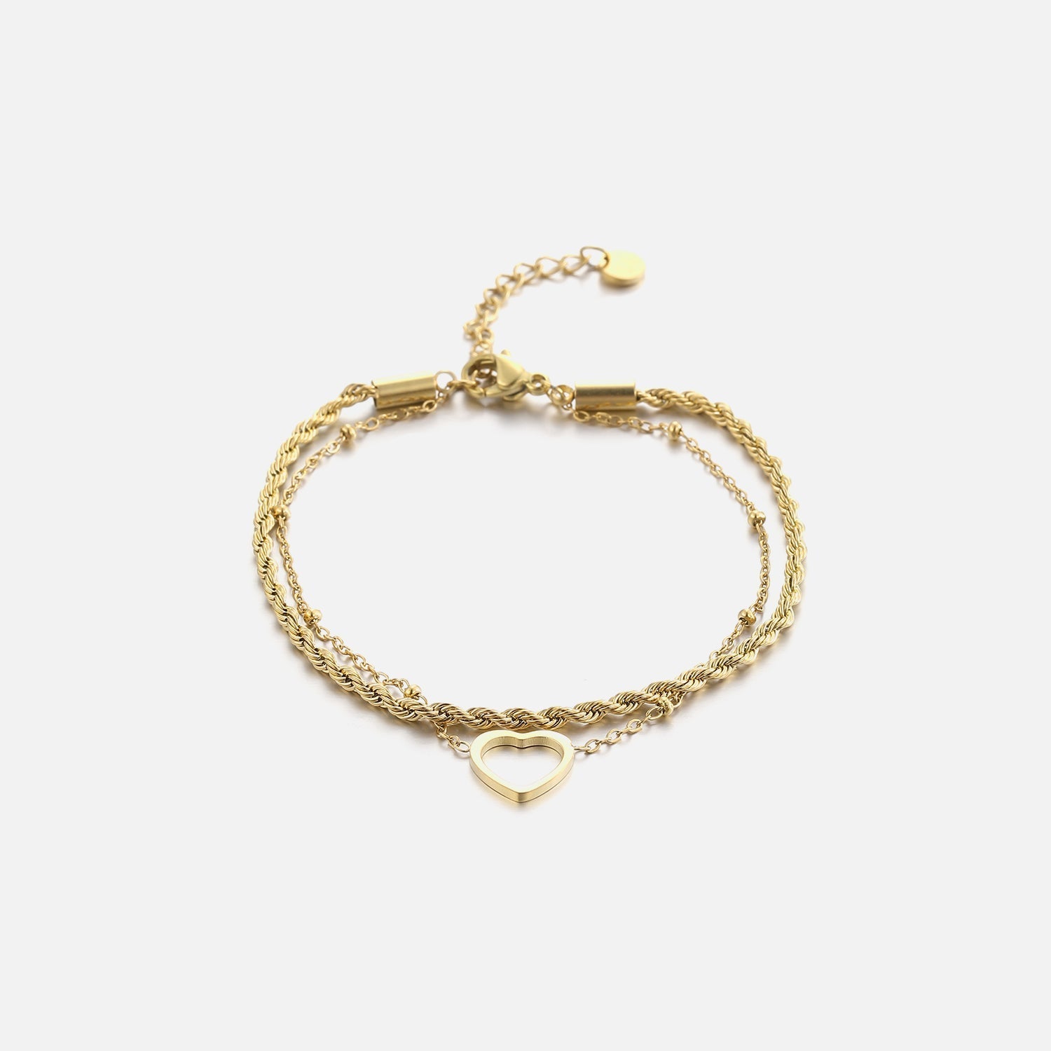 Armband gedraaid hartje goud - Desieradenconcurrent.nl