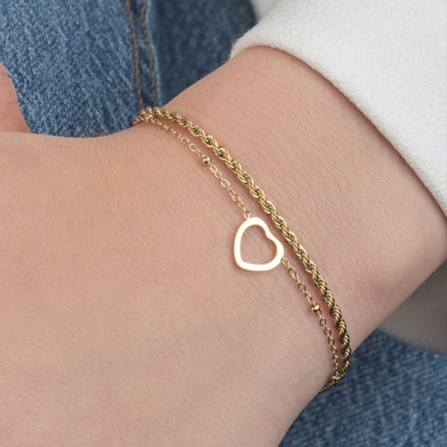 Armband gedraaid hartje goud - Desieradenconcurrent.nl