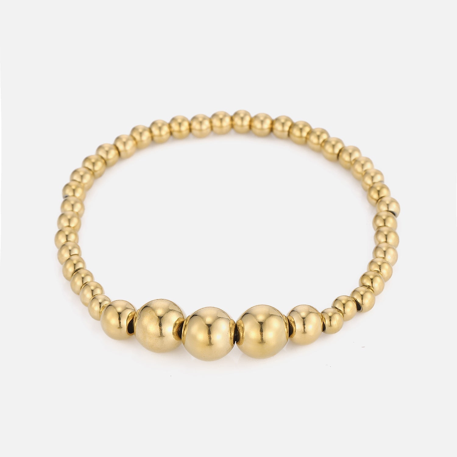 Armband grote bolletjes stretch goud - Desieradenconcurrent.nl