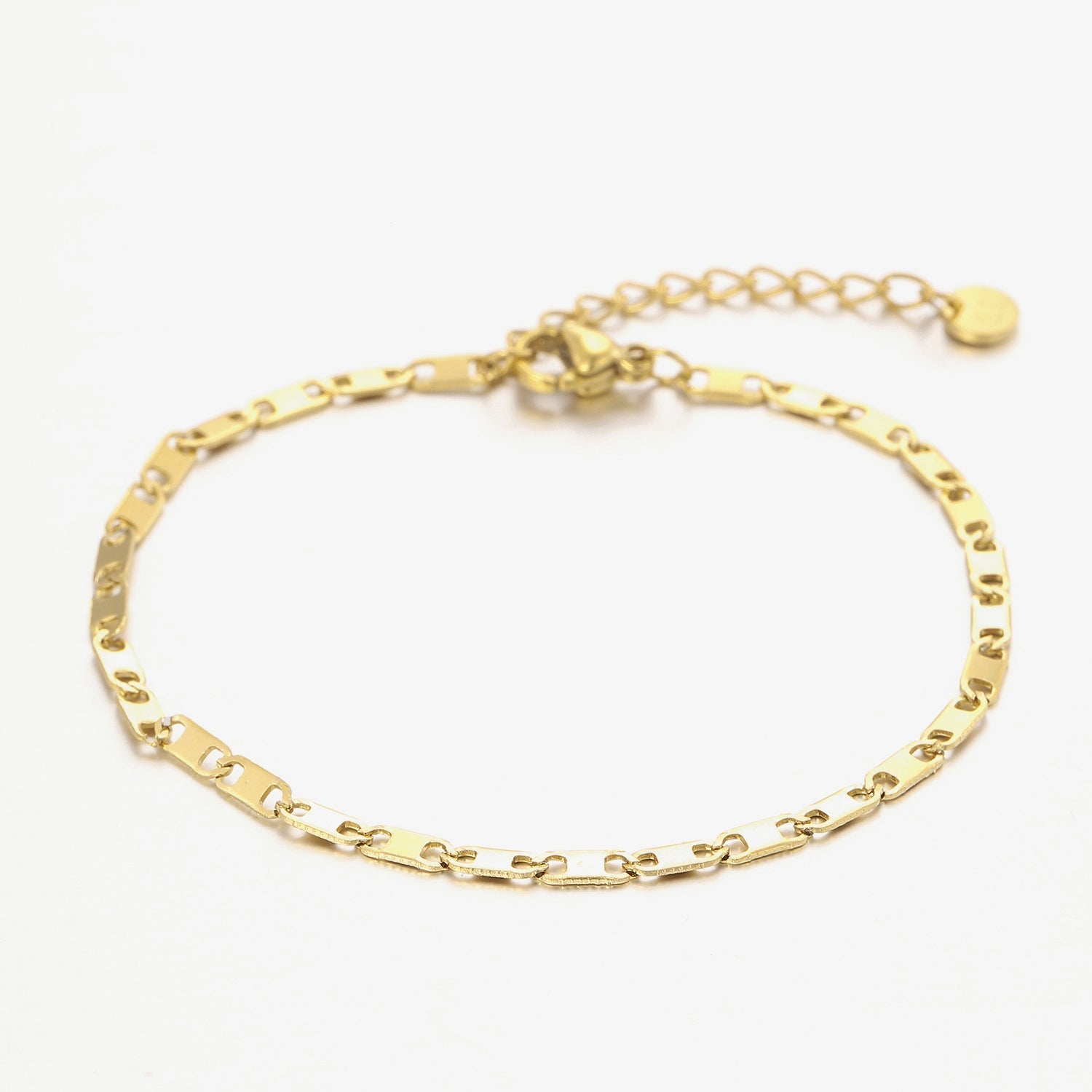 Armband platte schakel goud - Desieradenconcurrent.nl