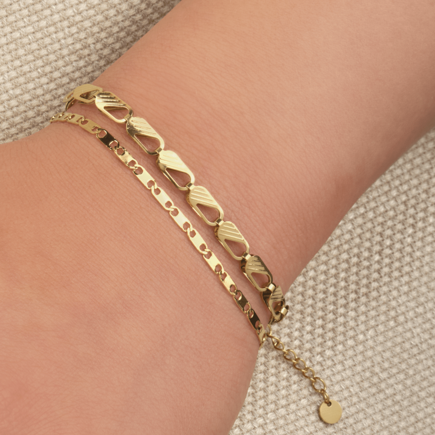 Armband platte schakel goud - Desieradenconcurrent.nl