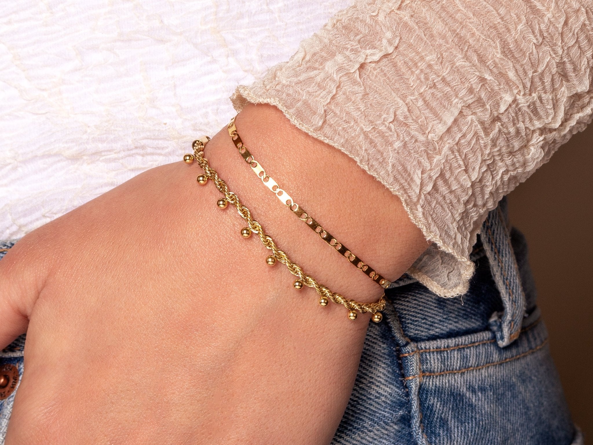 Armband platte schakel goud - Desieradenconcurrent.nl