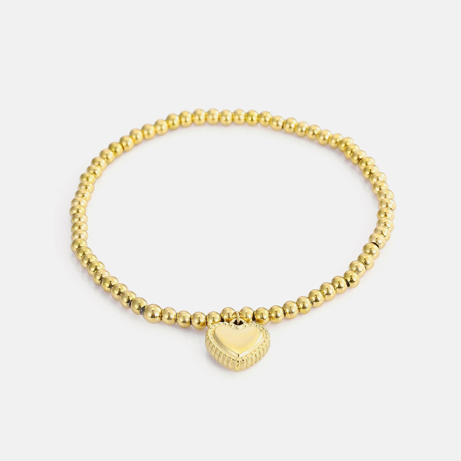 Armband stretch fancy hart goud - Desieradenconcurrent.nl