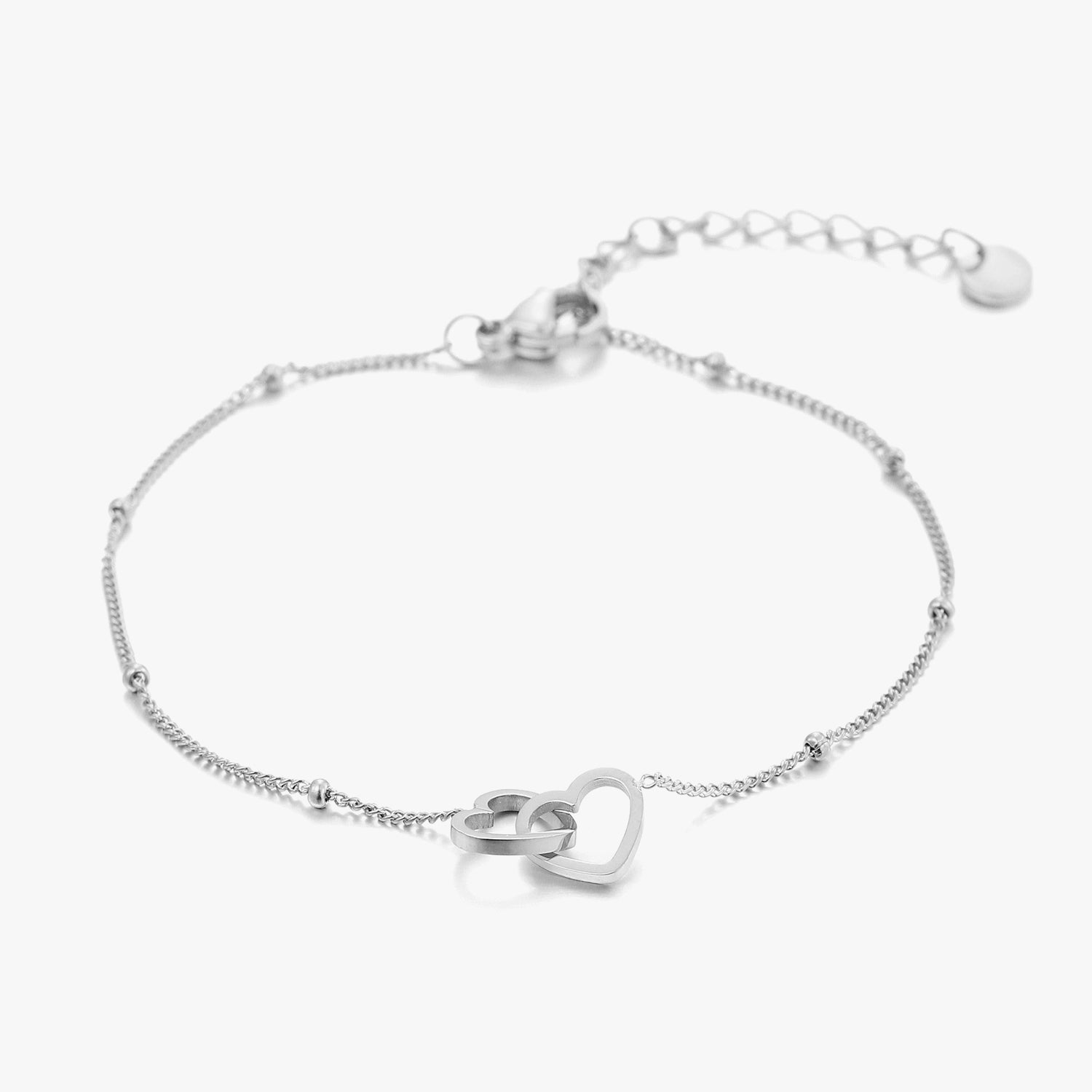 Armband verbonden hartjes zilver - Desieradenconcurrent.nl
