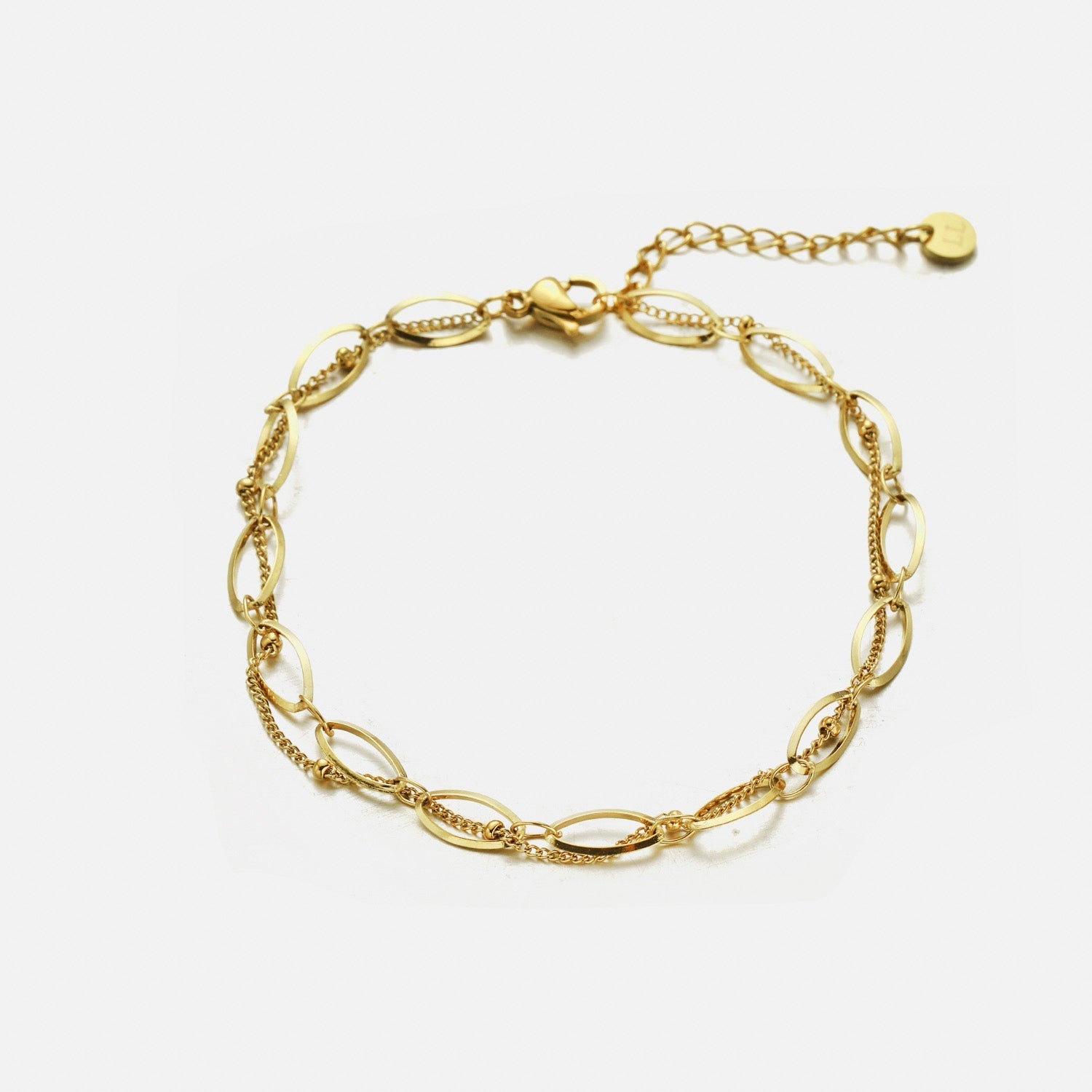 Armband vlecht balletjes goud - Desieradenconcurrent.nl