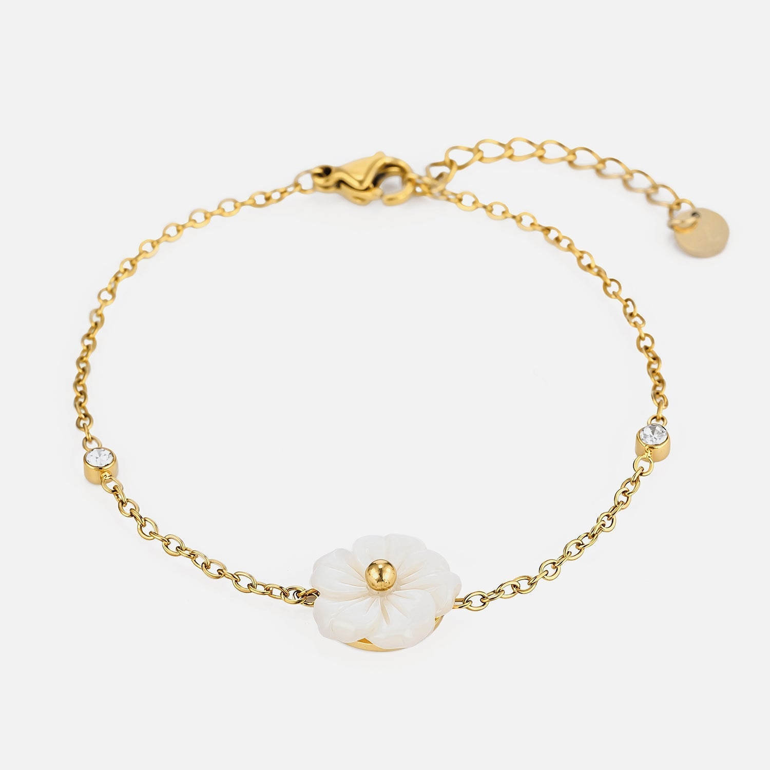 Armband witte bloem goud - Desieradenconcurrent.nl