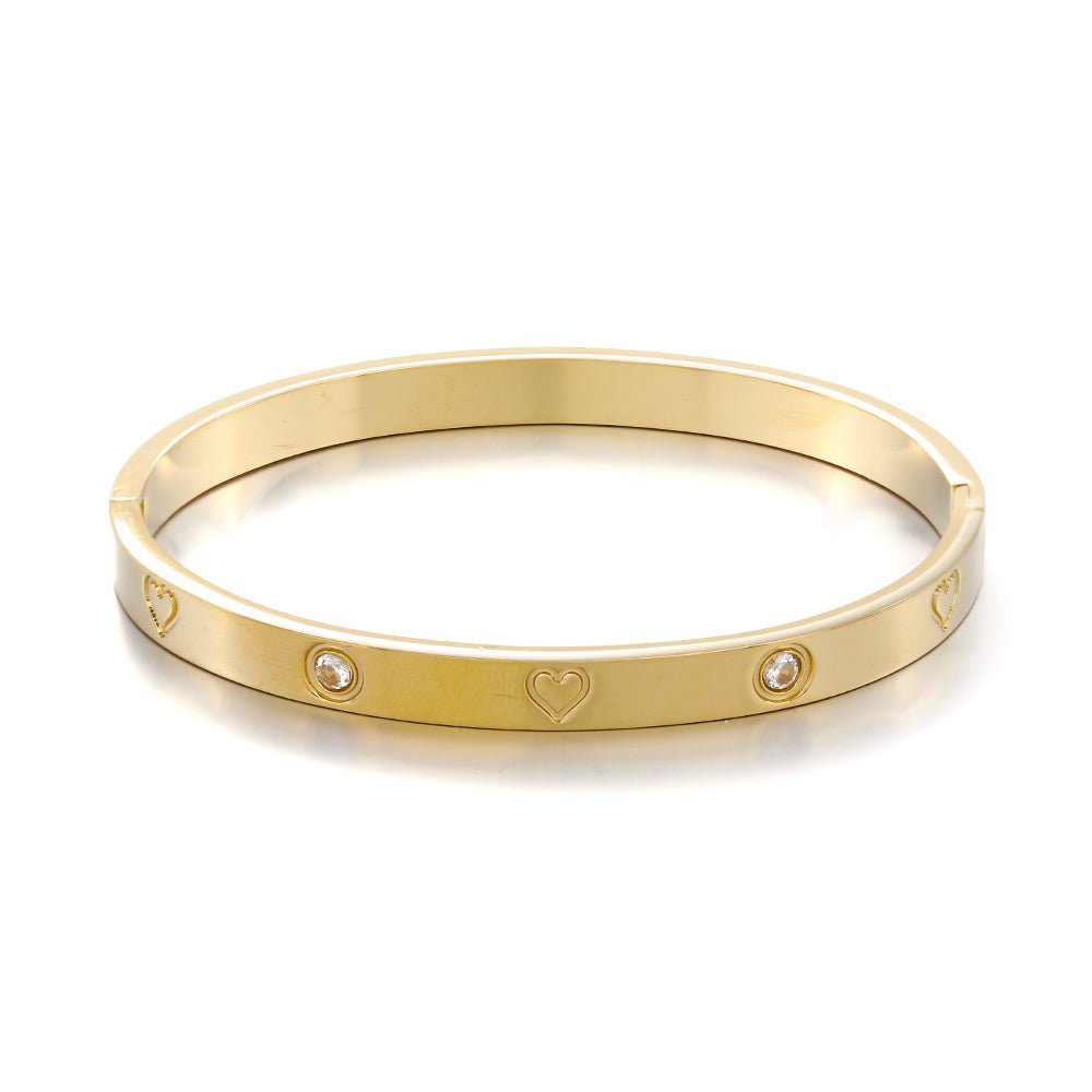 Bangle hartjes goud - Desieradenconcurrent.nl