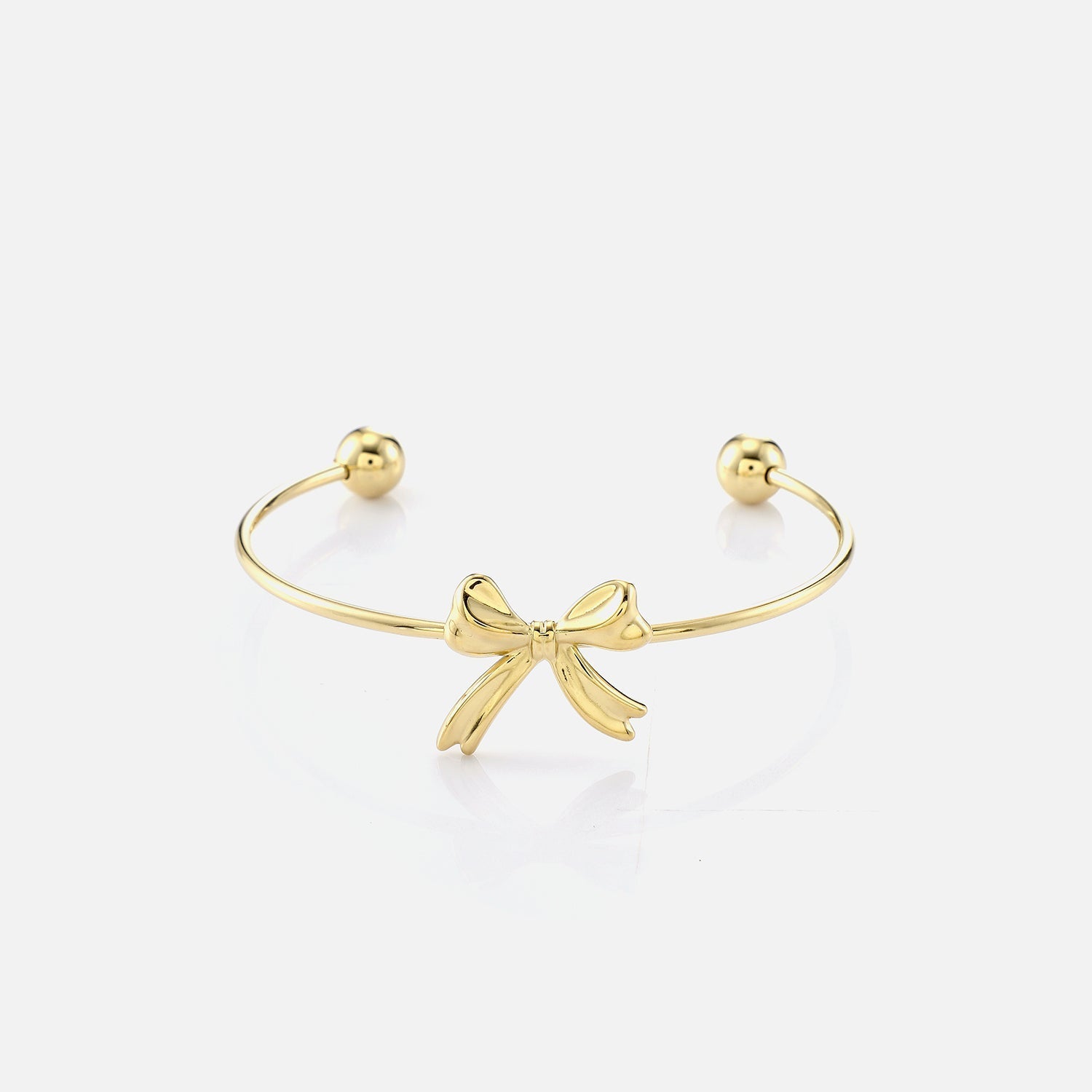 Bangle strikje goud - Desieradenconcurrent.nl