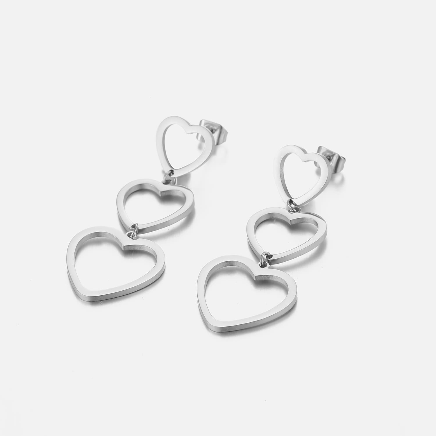 Drie hangende hartjes zilver - Desieradenconcurrent.nl