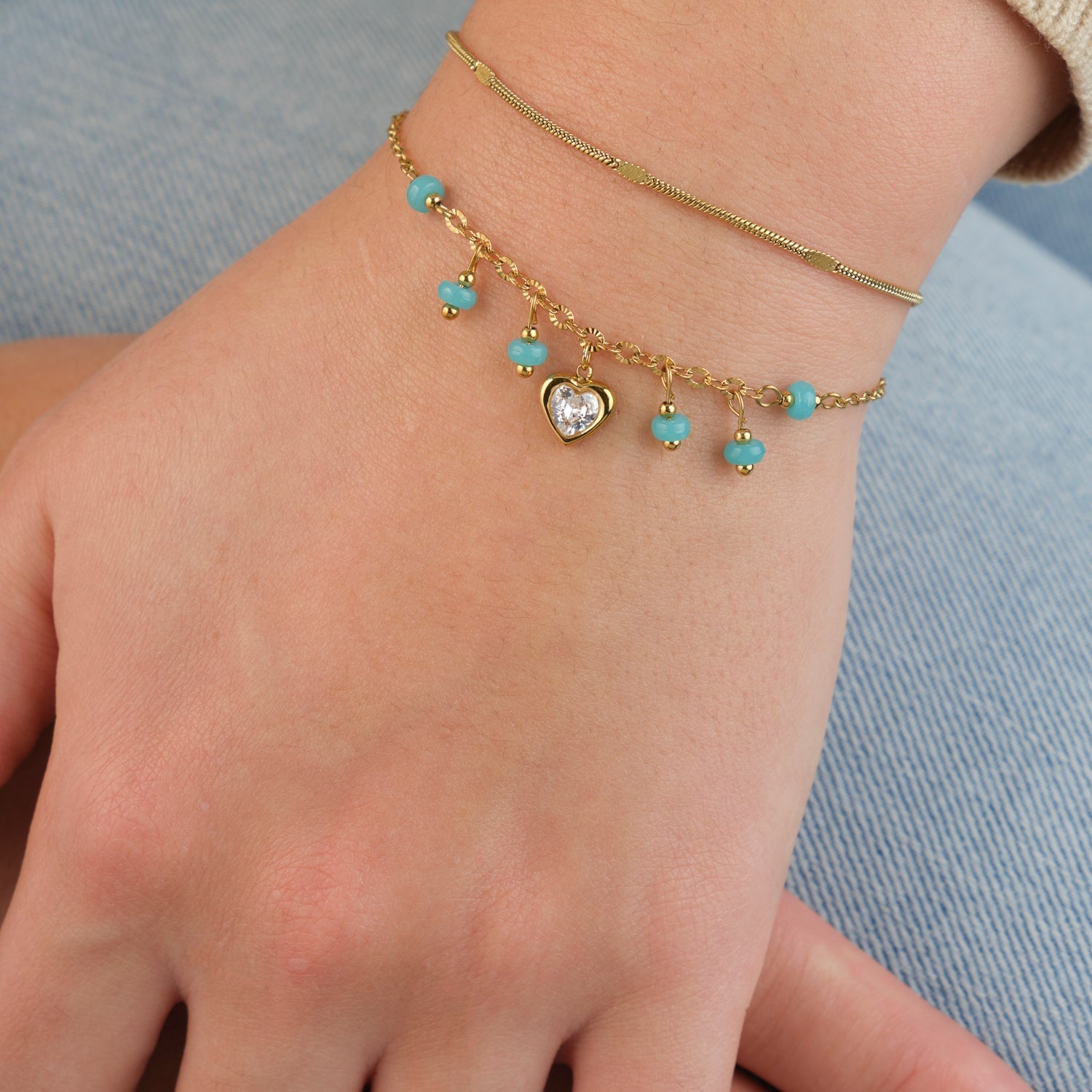 Dunne motief armband goud - Desieradenconcurrent.nl