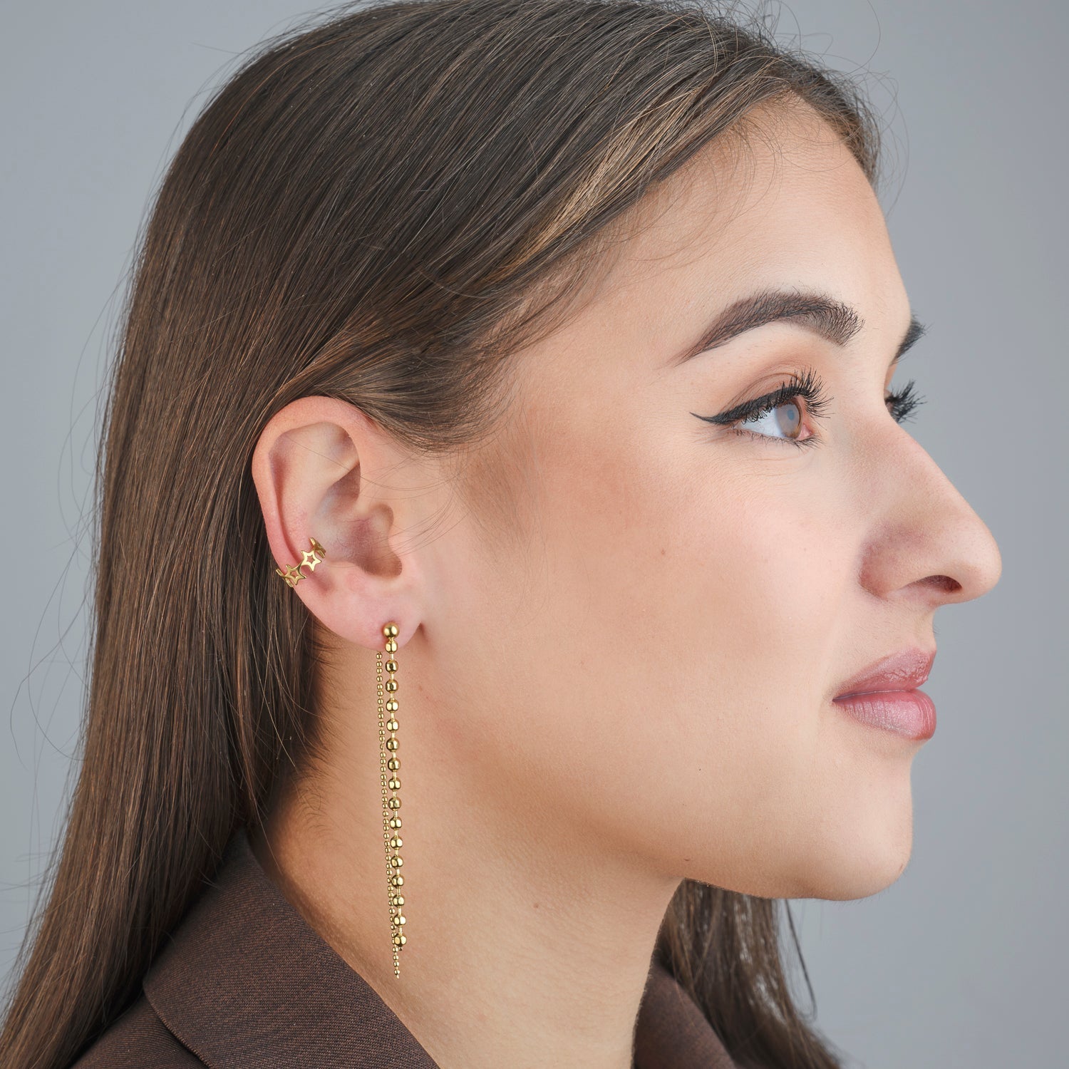 Ear cuff verbonden sterren goud - Desieradenconcurrent.nl