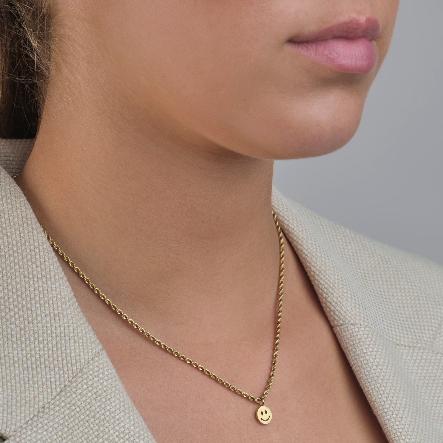 Gedraaide ketting happy goud - Desieradenconcurrent.nl