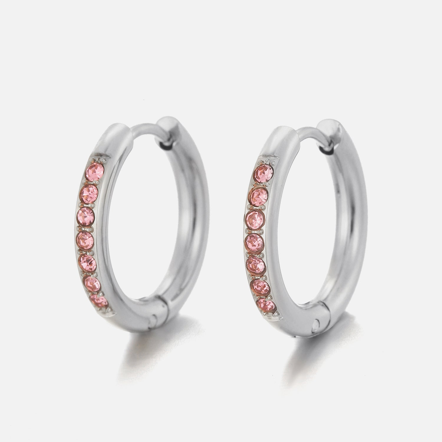 Hoops met steentjes roze/zilver - Desieradenconcurrent.nl