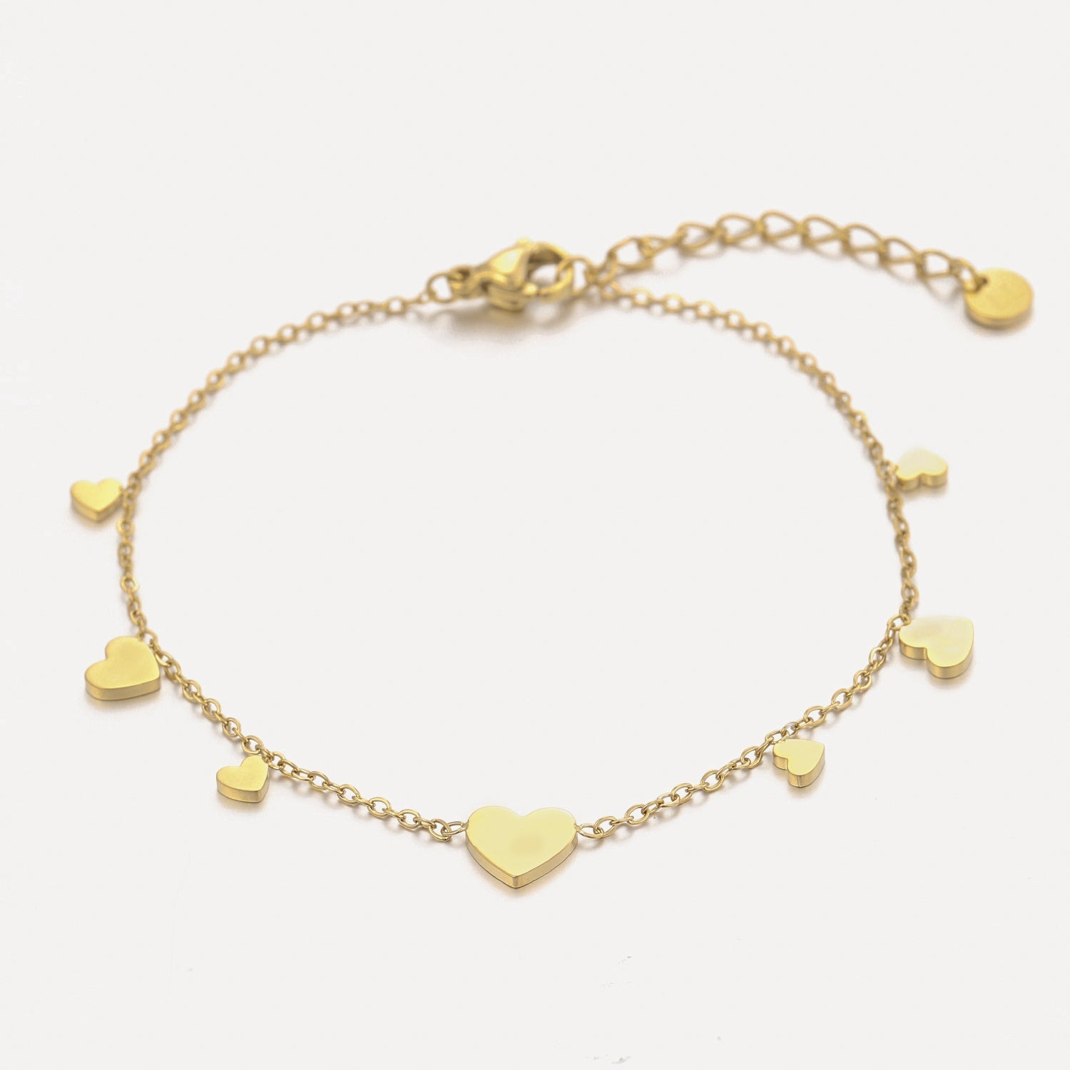 Meerdere hartjes armband goud - Desieradenconcurrent.nl