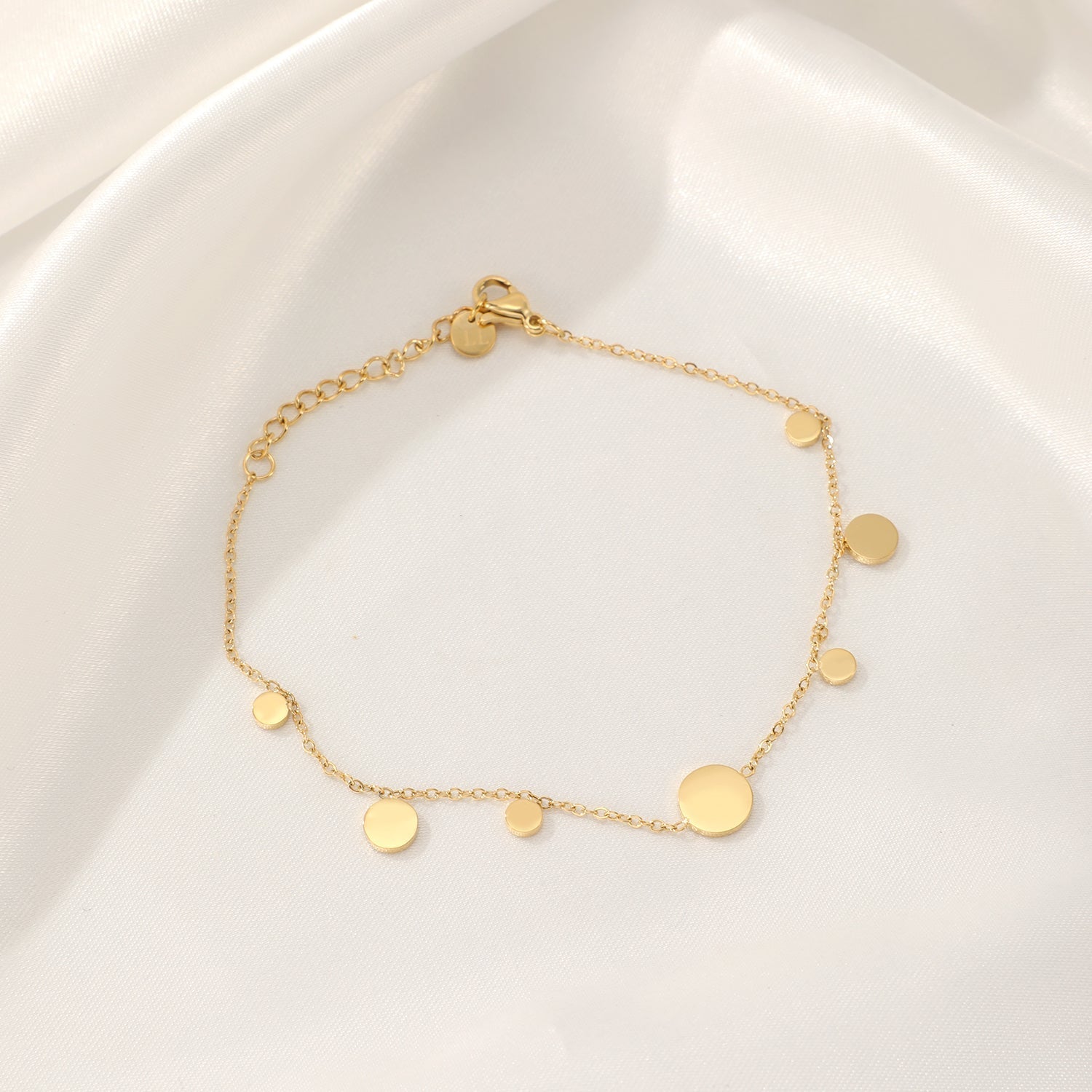 Muntjes armband goud - Desieradenconcurrent.nl