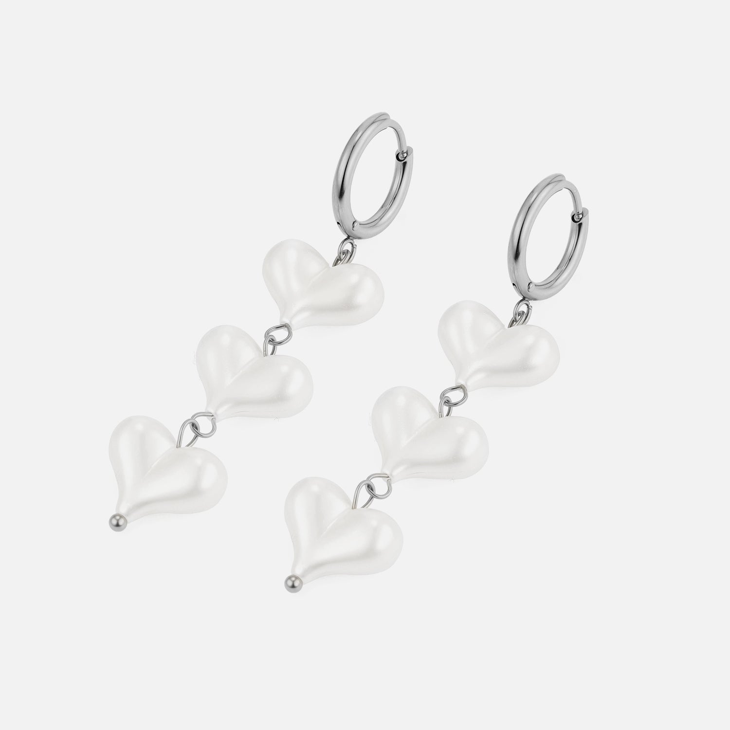 Oorbellen hangende parel hartjes zilver - Desieradenconcurrent.nl