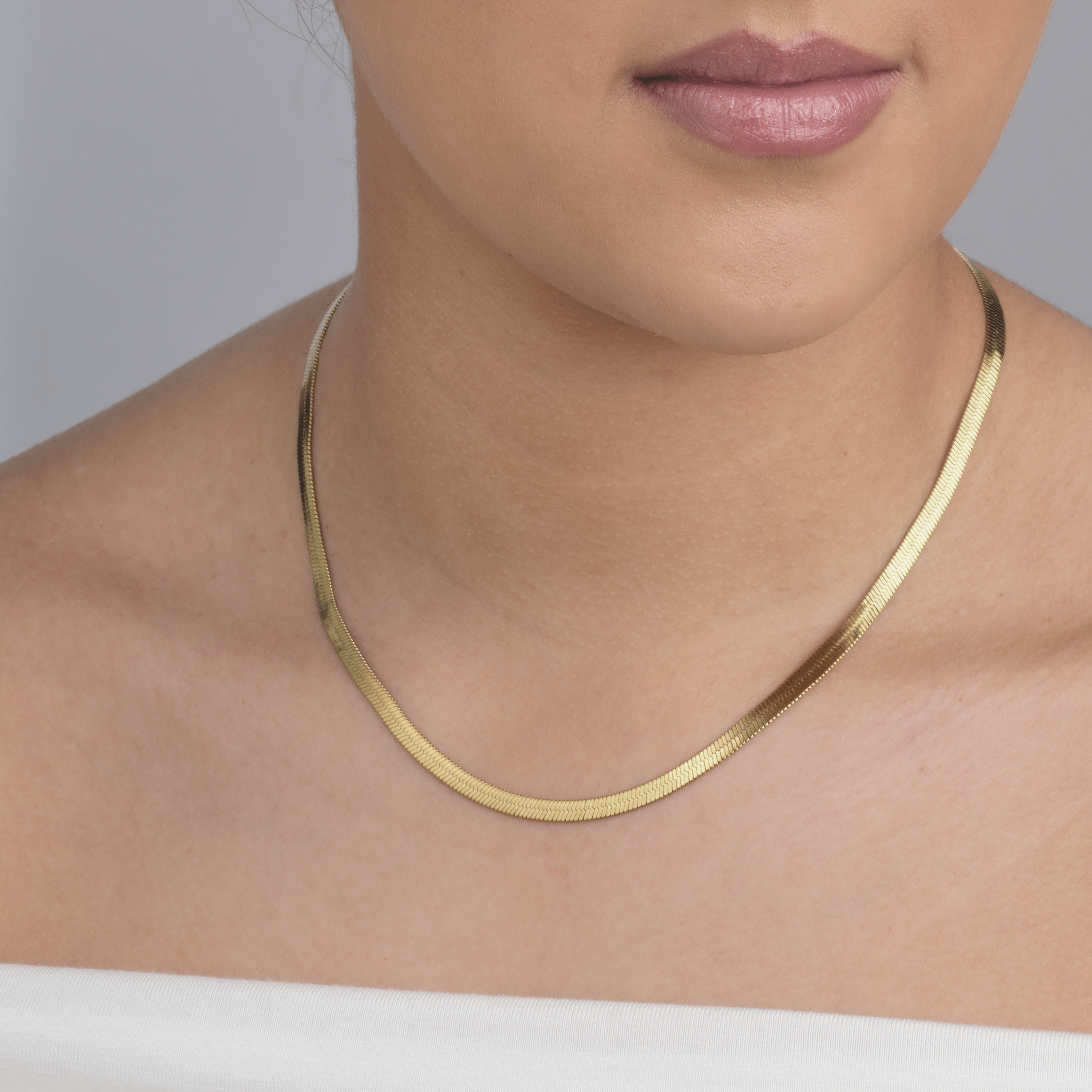 Platte ketting 4mm goud - Desieradenconcurrent.nl