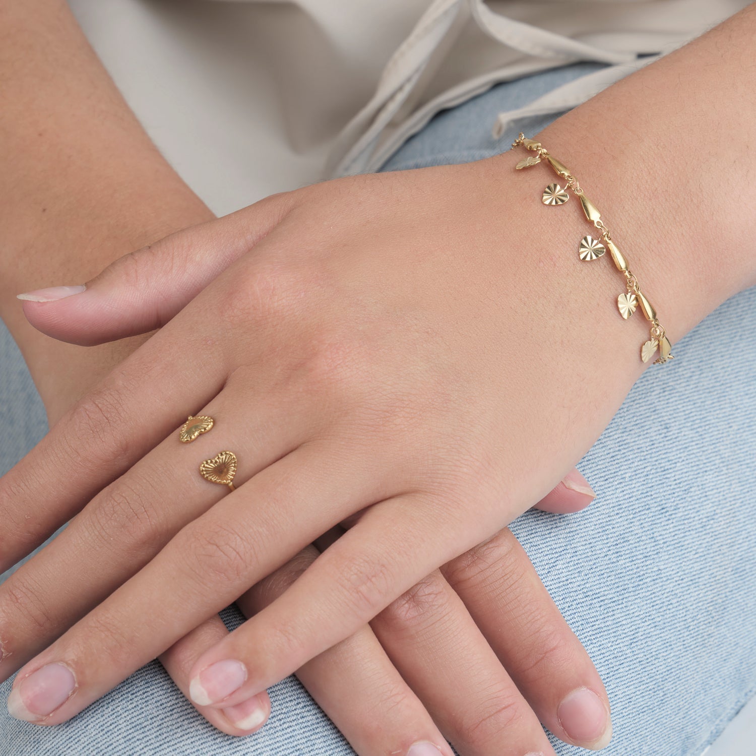Ring twee hartjes goud - Desieradenconcurrent.nl