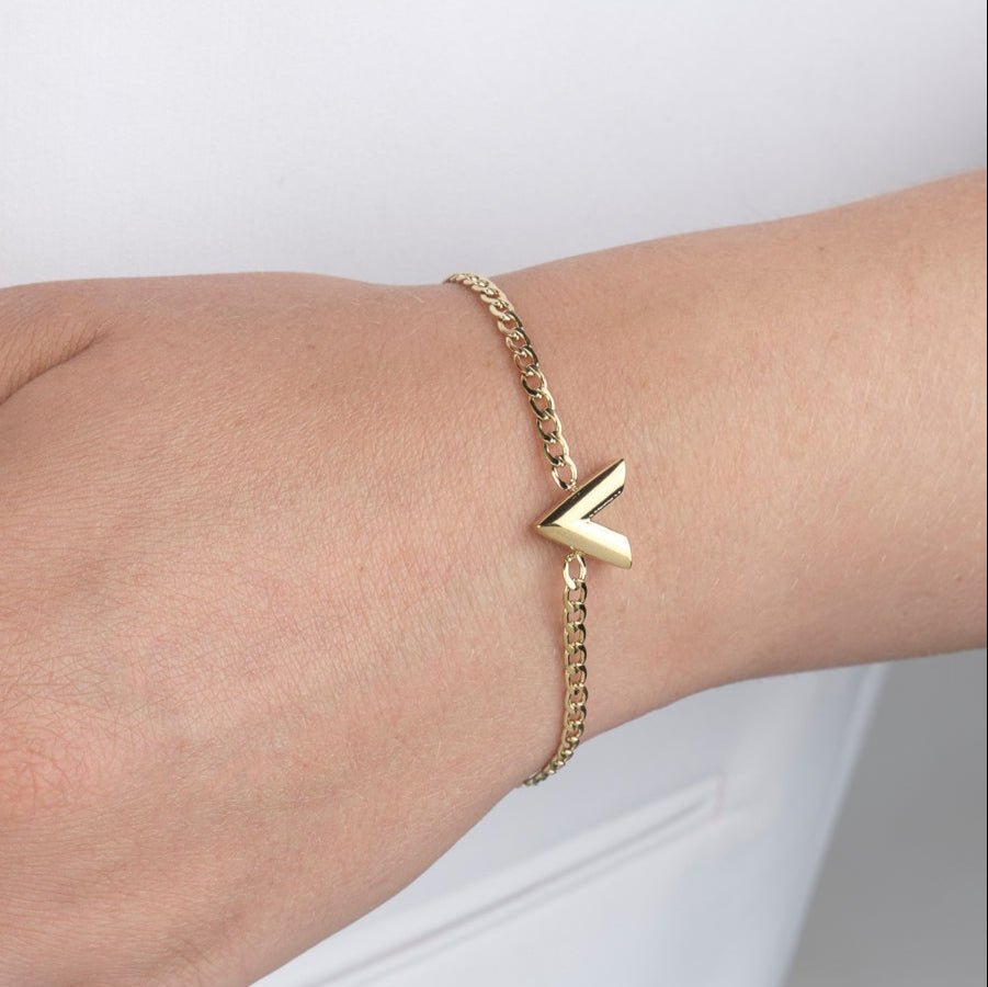 Schakelarmband V goud - Desieradenconcurrent.nl