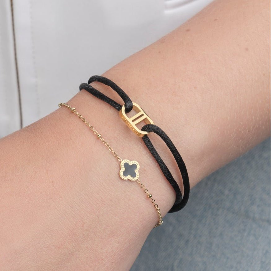 Single klaver armband goud/zwart - Desieradenconcurrent.nl