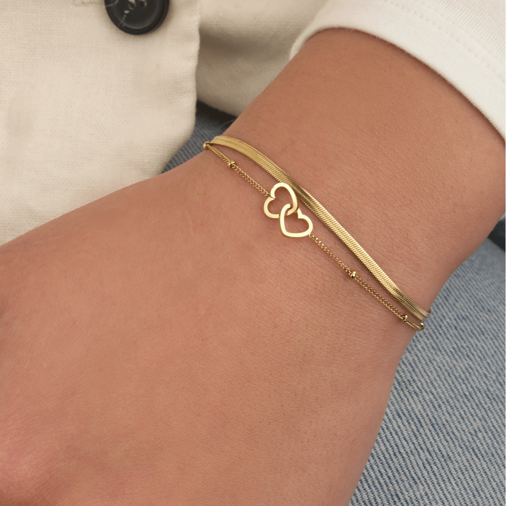 Tweelaags armband hartjes goud - Desieradenconcurrent.nl