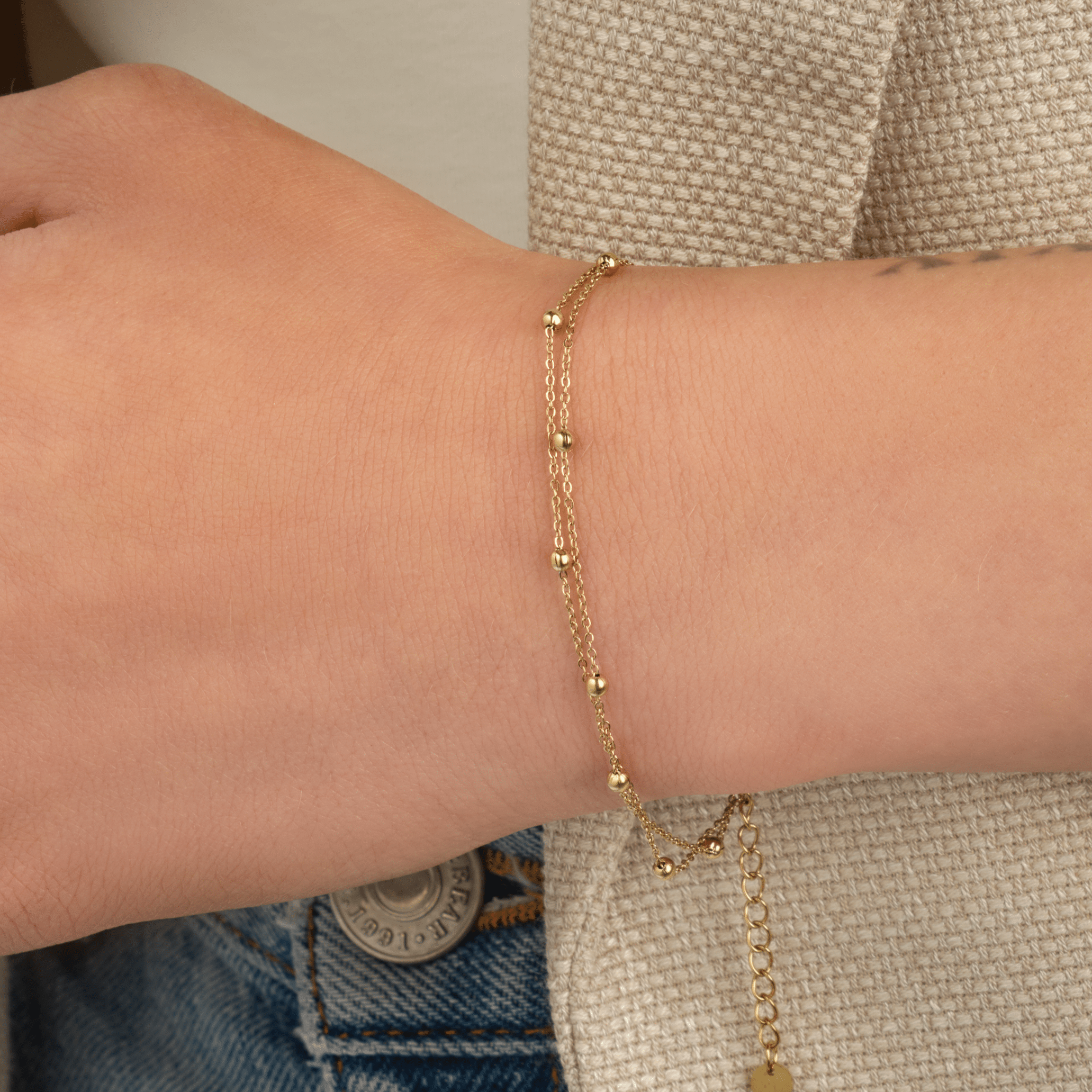 Tweelaags bolletjes armband goud - Desieradenconcurrent.nl